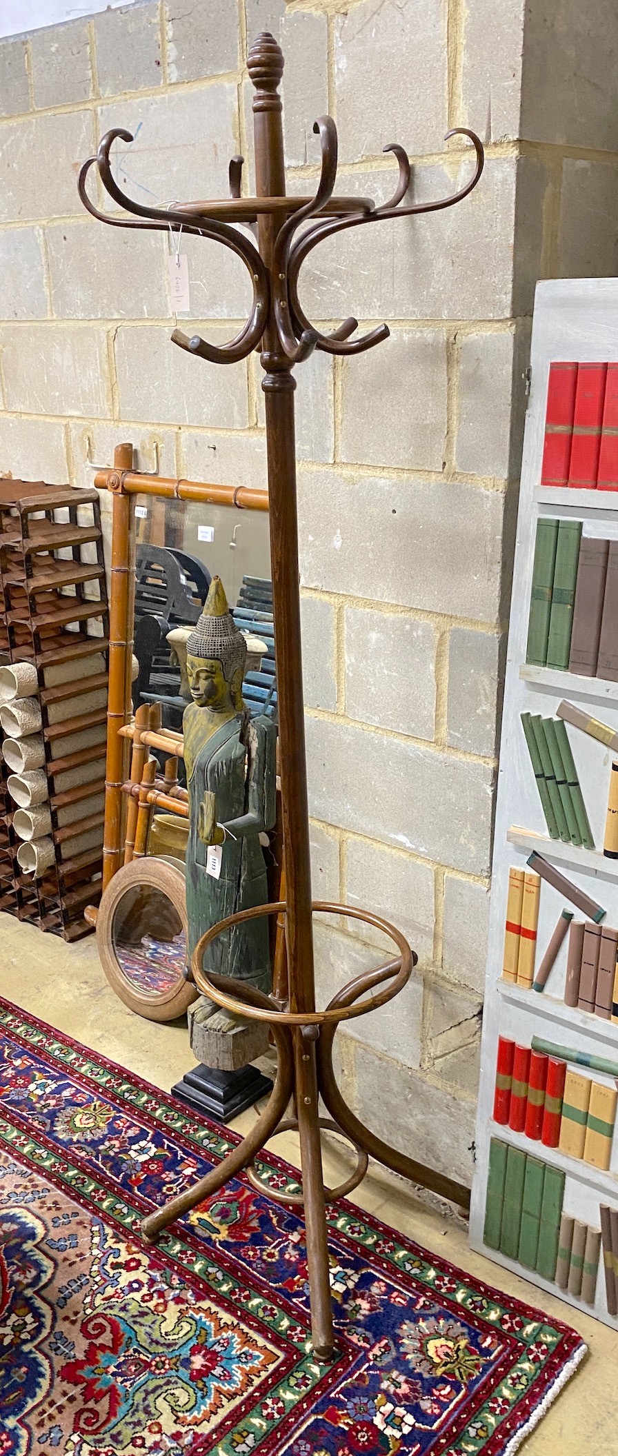 A large stained beech bentwood coat stand, height 192cm